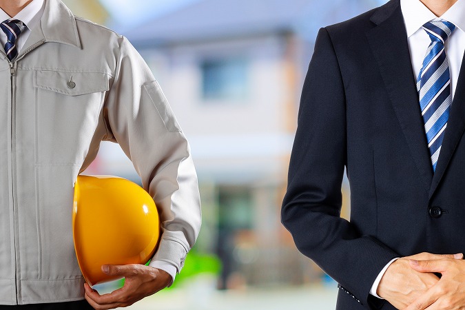 作業員と営業マン